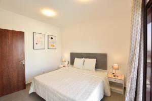 Ένα ή περισσότερα κρεβάτια σε δωμάτιο στο Mirador del Mar Lanzarote +22 φωτογραφίες