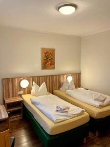 Cama ou camas em um quarto em Lindenhaus Scharfe Kurve