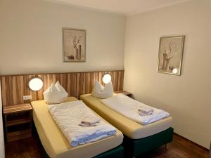 Cama ou camas em um quarto em Lindenhaus Scharfe Kurve