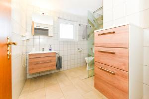 Koupelna v ubytování Gästehaus Genf