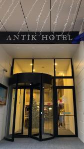 a building with a sign on the front of it at Antik Hotel Istanbul in Istanbul