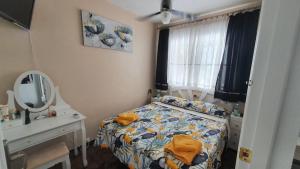 Posteľ alebo postele v izbe v ubytovaní Apartamenty Deluxe - Los Naufragos -Torrevieja Costa Blanca