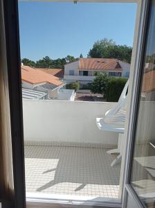 a view from the door of a balcony at Les fermettes de la mer 2 in Saint-Jean-de-Monts