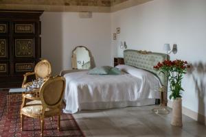 Postel nebo postele na pokoji v ubytování Masseria Fontana di Vite