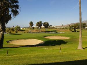 Golfe no hotel ou nos arredores