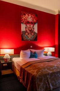 Postel nebo postele na pokoji v ubytování Boutique Hotel Rothenburger Hof