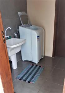 Ένα μπάνιο στο Residencial Lumar