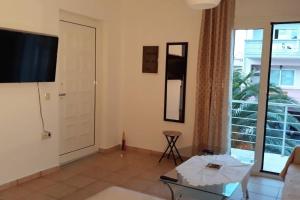 A television and/or entertainment centre at Roof-Garden Apartment
