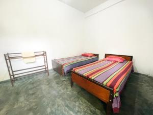 Katil atau katil-katil dalam bilik di Dealings Freedom Rest