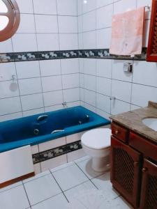 Ванная комната в Ótima Casa para 10 pessoas /menos de 100m da Praia
