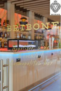 a glass window of a bar in a restaurant at Melia Alicante in Alicante