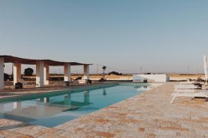 Bazén v ubytování Masseria Fontana di Vite nebo v jeho okolí