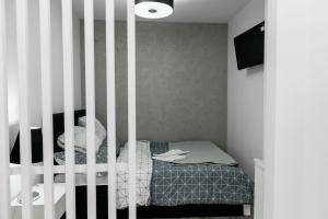 Posteľ alebo postele v izbe v ubytovaní Apartament z łożem małżeńskim - bezpłatny parking