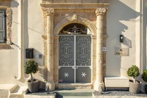 The facade or entrance of Melitia Traditional House