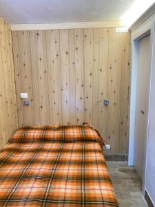 Giường trong phòng chung tại MariSole Apt Lago Rotondo