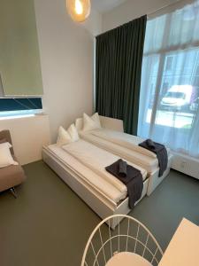 Llit o llits en una habitació de Main Station Design Loft Style Apartment