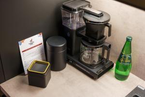 Nápoje v ubytovaní Apartament Deluxe BLACK ORCHID Baltic Concept Dźwirzyno