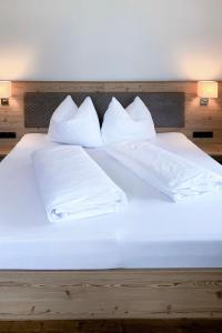 מיטה או מיטות בחדר ב-Apartment Neuner - MHO620 by Interhome