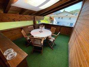 an overhead view of a table and chairs on a balcony at Apartment Haus Grazia - PTZ154 by Interhome in Prutz