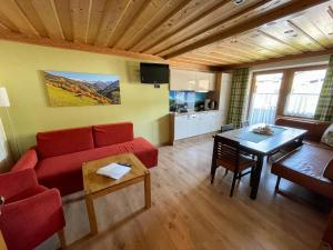 TV a/nebo společenská místnost v ubytování Apartment Haus Grazia by Interhome