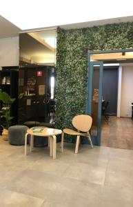 Posezení v ubytování Hotel Le Cygne d'Argent