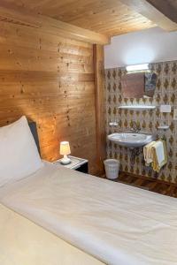 Łóżko lub łóżka w pokoju w obiekcie Apartment Gangerhof by Interhome