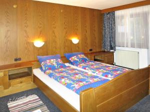 Łóżko lub łóżka w pokoju w obiekcie Apartment Max by Interhome