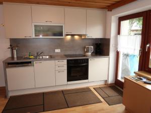 Кухня или кухненски бокс в Apartment Zechner - TDL101 by Interhome