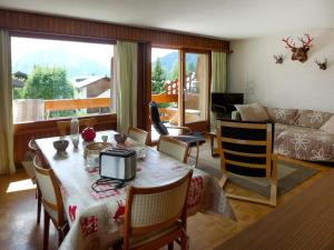 Posezení v ubytování Apartment Val Neige 11 by Interhome + 11 fotografií