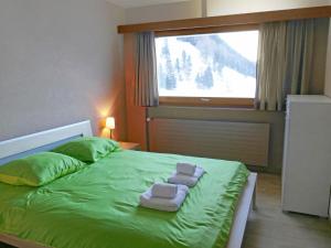 Кровать или кровати в номере Apartment Rosablanche B71 by Interhome