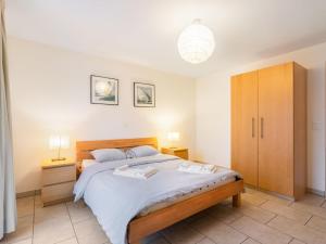 Katil atau katil-katil dalam bilik di Apartment Cook P1-3 by Interhome