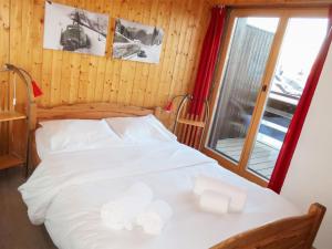 Letto o letti in una camera di Apartment Bisse-Vieux A-4 by Interhome