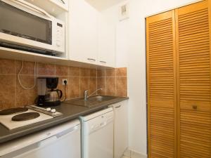 Kuchyň nebo kuchyňský kout v ubytování Apartment Le Cap Bleu-1 by Interhome + 16 fotografií