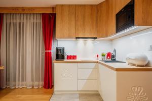 Kuchyňa alebo kuchynka v ubytovaní Apartament Podwika