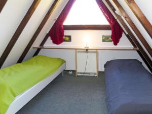 Postel nebo postele na pokoji v ubytování Holiday Home Oslo by Interhome