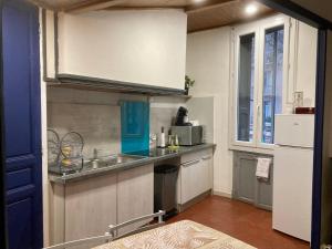 Una cocina o kitchenette en Le COSY de Mercadet - Parking gratuit & Wifi
