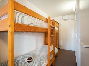 two bunk beds in a room with a hallway at Apartment Les Grandes Platières-15 by Interhome in Tignes