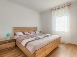 Ένα ή περισσότερα κρεβάτια σε δωμάτιο στο Holiday Home Vita by Interhome
