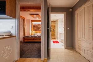 Posteľ alebo postele v izbe v ubytovaní Apartament Podwika
