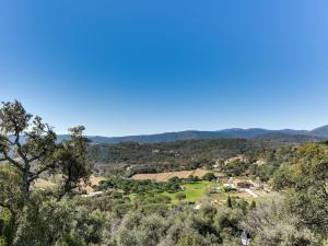 a view of the valley from the hill at Holiday Home Les Migraniers by Interhome in Grimaud