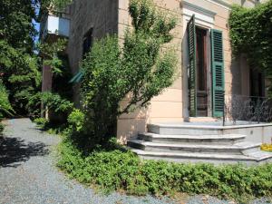 a house with steps leading to a window at Apartment Bagnolo by Interhome in Albisola Superiore