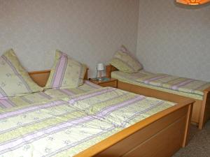 Katil atau katil-katil dalam bilik di Apartment Haus Silberdistel by Interhome