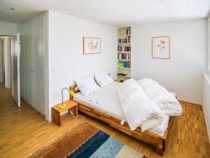 Postel nebo postele na pokoji v ubytování Apartment Melina by Interhome