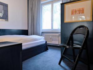 Postel nebo postele na pokoji v ubytování Apartment Chesa Romantica 17 by Interhome + 15 fotografií