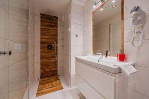 Kúpeľňa v ubytovaní Apartament Podwika