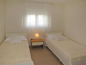 Posteľ alebo postele v izbe v ubytovaní Holiday Home Silvija by Interhome