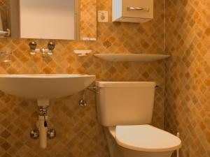 Koupelna v ubytování Apartment Chesa Ova Cotschna 205 by Interhome
