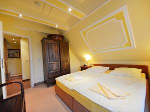 Ένα ή περισσότερα κρεβάτια σε δωμάτιο στο Holiday Home Moosbeere by Interhome