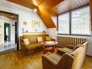 A seating area at Apartment Paulownia by Interhome