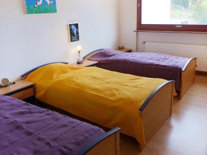 Un pat sau paturi într-o cameră la Apartment Rosablanche B21 by Interhome